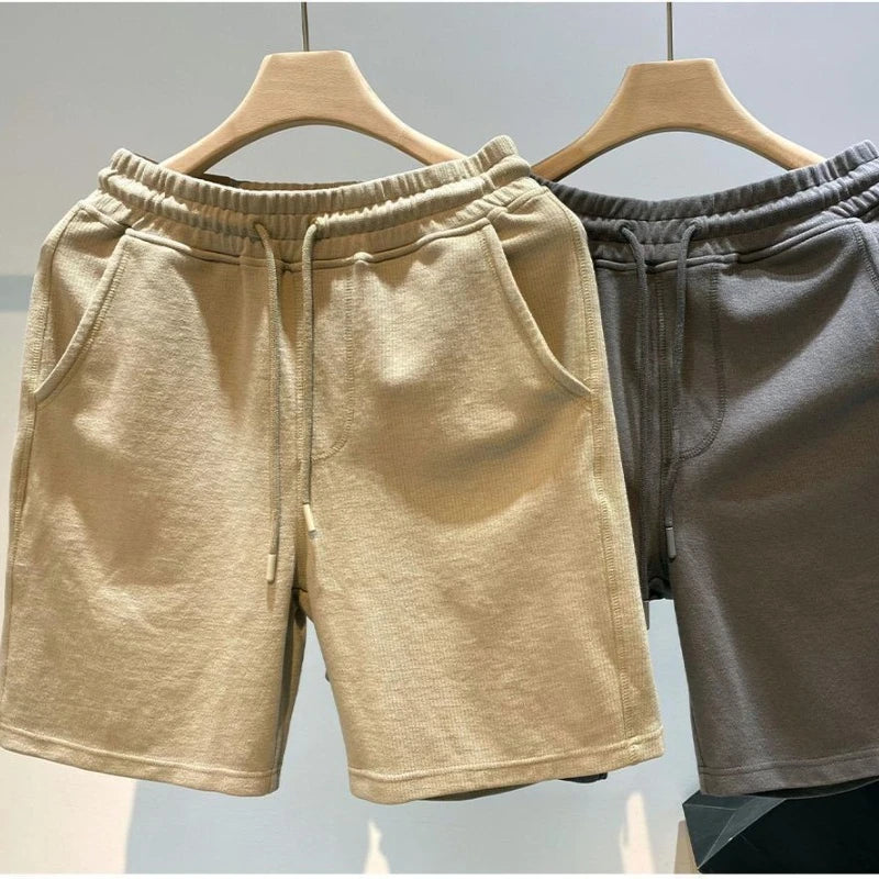 Pantalones cortos para hombre, moda Popular de verano, marca de tendencia, pantalones sueltos de cinco cuartos, pantalones casuales de moda, nuevos pantalones casuales