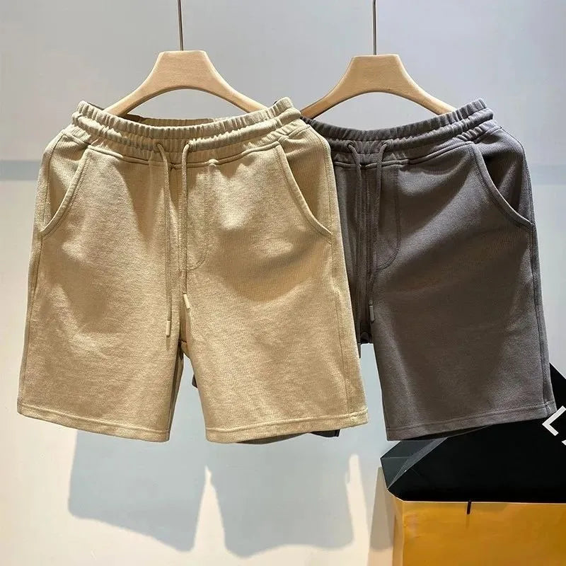 Pantalones cortos para hombre, moda Popular de verano, marca de tendencia, pantalones sueltos de cinco cuartos, pantalones casuales de moda, nuevos pantalones casuales