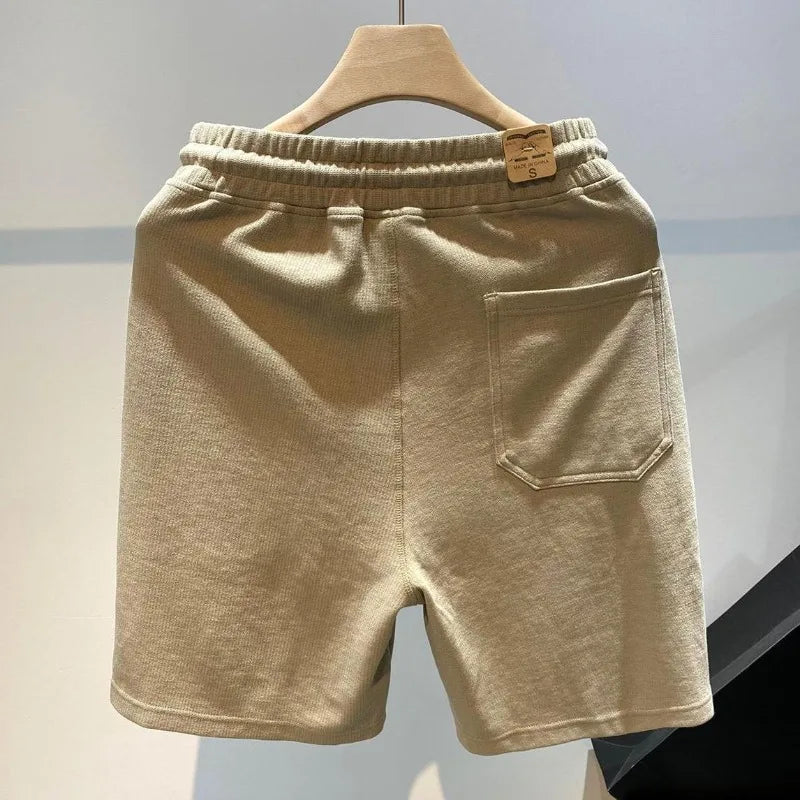Pantalones cortos para hombre, moda Popular de verano, marca de tendencia, pantalones sueltos de cinco cuartos, pantalones casuales de moda, nuevos pantalones casuales