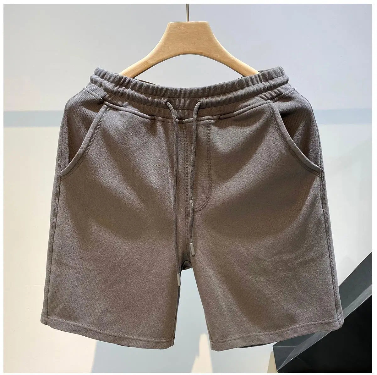 Pantalones cortos para hombre, moda Popular de verano, marca de tendencia, pantalones sueltos de cinco cuartos, pantalones casuales de moda, nuevos pantalones casuales