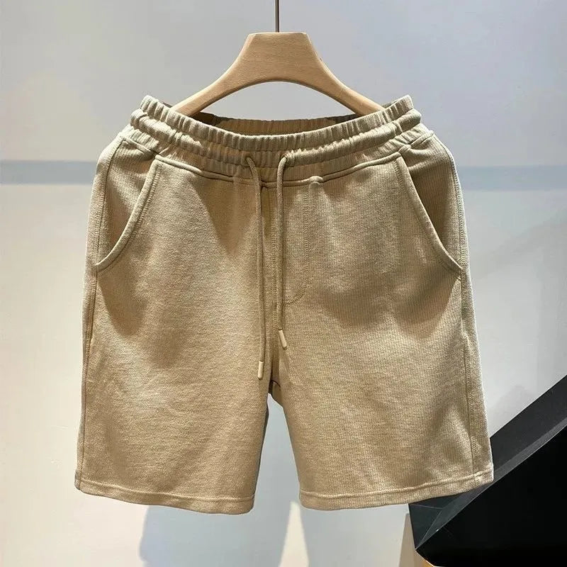 Pantalones cortos para hombre, moda Popular de verano, marca de tendencia, pantalones sueltos de cinco cuartos, pantalones casuales de moda, nuevos pantalones casuales