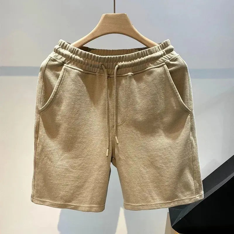 Pantalones cortos para hombre, moda Popular de verano, marca de tendencia, pantalones sueltos de cinco cuartos, pantalones casuales de moda, nuevos pantalones casuales