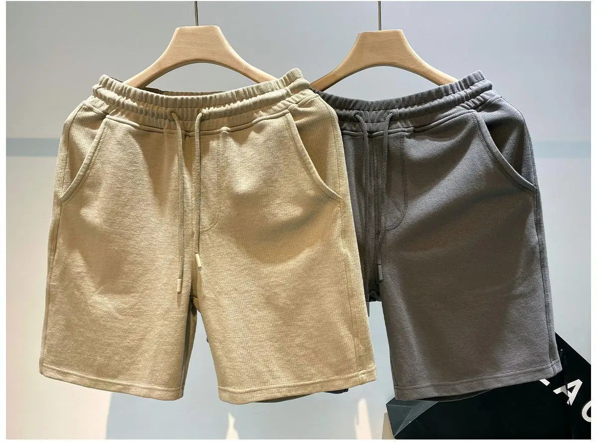 Pantalones cortos para hombre, moda Popular de verano, marca de tendencia, pantalones sueltos de cinco cuartos, pantalones casuales de moda, nuevos pantalones casuales
